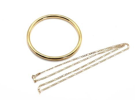 A hollow gold bangle, the tubular hollow bangle, stamped 9ct, tested as 9ct gold, internal diameter 65mm, 9.36gtogether with 