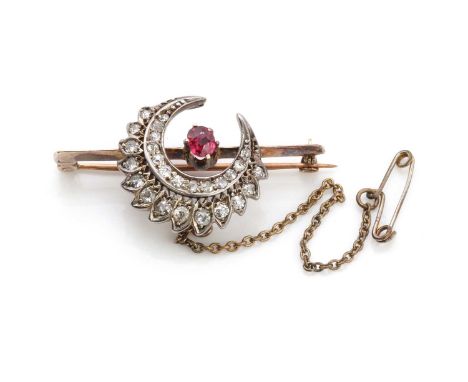 A late Victorian ruby and diamond crescent bar brooch, with an oval mixed cut ruby, claw set to the centre of a closed cresce