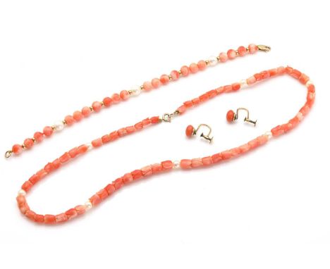 A carved coral and cultured pearl necklace suite,comprising a necklace with slightly graduated carved tulip head beads, space