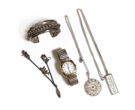 An 18ct gold Zenith bracelet watch, with steel bracelet, a tonneau case, with white dial and black Arabic numerals, subsidiar