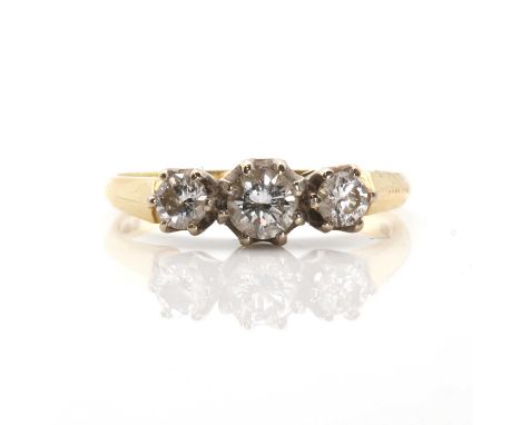 An 18ct gold three-stone diamond ring, a row of three graduated round brilliant diamonds claw set in white rex collets, to so