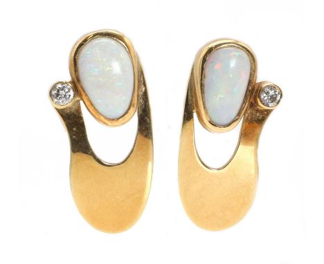 A pair of 18ct gold opal and diamond earrings,of abstract design. The free-form open plate, rub set with a cabochon white opa