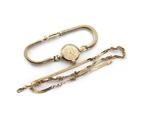 A ladies' 9ct gold Movado mechanical bracelet watch,a silvered dial, alternating gilt Arabic and baton hour markers, gilt swo