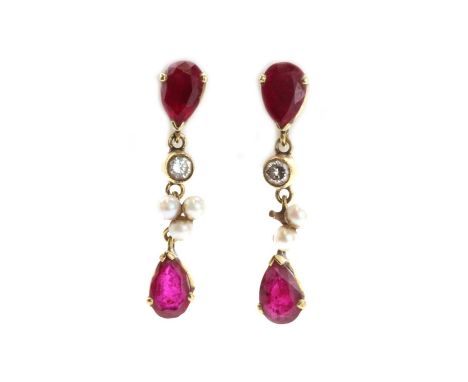 A pair of ruby, diamond and cultured pearl drop earrings,with a pear cut ruby, claw set to the top. A brilliant cut diamond, 