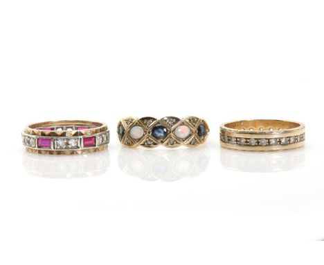 Three gold rings, comprising a 9ct gold sapphire, opal and diamond ring, with alternating oval mixed cut sapphires and oval c