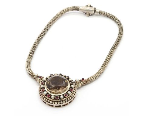 A smoky quartz, garnet and split pearl cluster necklace,with a large round mixed cut smoky quartz, approximately 28mm in diam