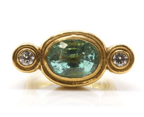 An 18ct gold paraiba tourmaline and diamond ring, by Charmian Harris, commissioned and made by Charmian Harris. An oval mixed