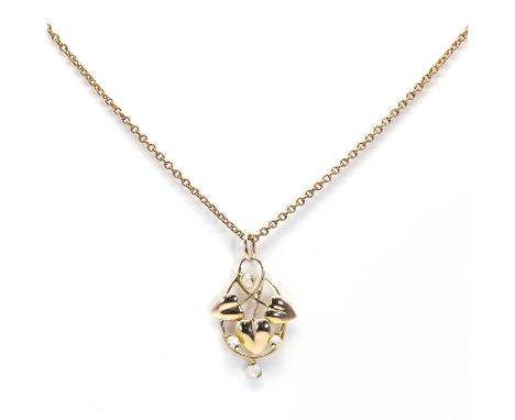An Art Nouveau gold and pearl pendant, by Murrle Bennett &amp; Co.,designed as an openwork wire frame with leaves and blister