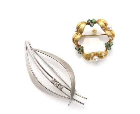 Two gold brooches,comprising a gold emerald and cultured pearl brooch, a trefoil of round mixed cut emeralds, claw set to cut