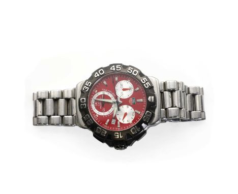 A Gentleman's stainless steel Tag Heuer Formula 1 Professional chronograph quartz bracelet watch, 40mm diameter, a red dial, 