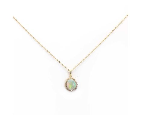 An opal and diamond oval cluster pendant,an oval cabochon crystal opal, 8.20mm x 10.90mm, to a surround of brilliant cut diam