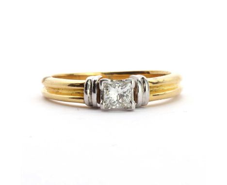 An 18ct gold single stone diamond ring, a princess cut diamond, 3.71mm x 3.62mm approximately, four claw set to a white pierc