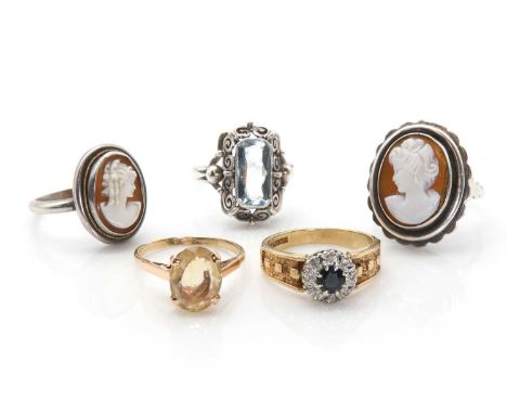 A small group of gold and silver rings, comprising a 9ct gold sapphire and diamond ring, Birmingham 1978, and a gold citrine 