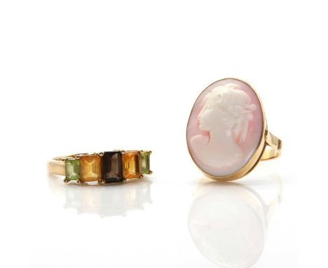 Two gold rings, comprising a 9ct gold five stone ring, set with graduating multicoloured gemstones in clawed collets, to holl