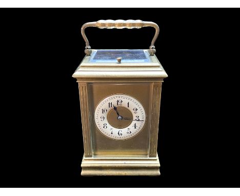 French Carriage Clock with repeating mechanism, cream chapter dial with Arabic numerals, marked Maple &amp; Co. Paris.  Of ty
