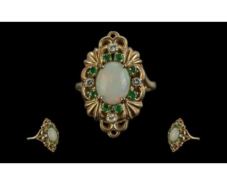 Ladies - Attractive and Superb 14ct Gold Opal Diamond and Emerald Set Ring of Excellent Design. Marked 14ct to Shank. The Cen