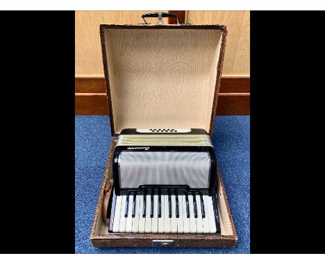 Sorrento Accordion, German made, in fitted case with handle.