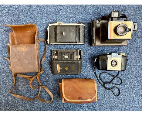 Four Vintage Cameras, comprising Kodak and Polaroid.
