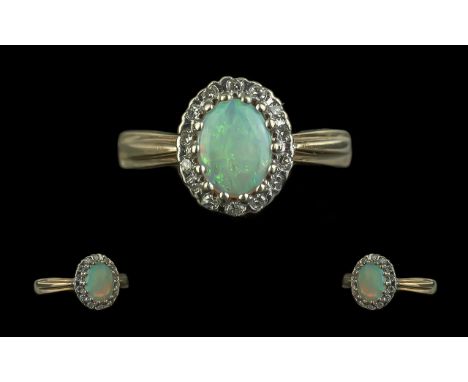 9ct Ladies Opal and Diamond Set Ring. Opal and Diamonds of Good Colour, Very Pretty Ring. Ring Size Q. 3.1 grams. 