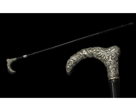 Antique Silver Topped Walking Stick with dragon and serpent decoration; 36 inches (90cms) long