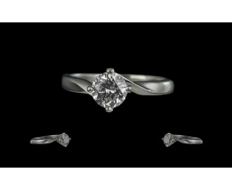 Platinum - Superior Quality Single Stone Diamond Set Ring. Marked 950 to Interior of Shank. Ring Size K. The Round Modern Bri