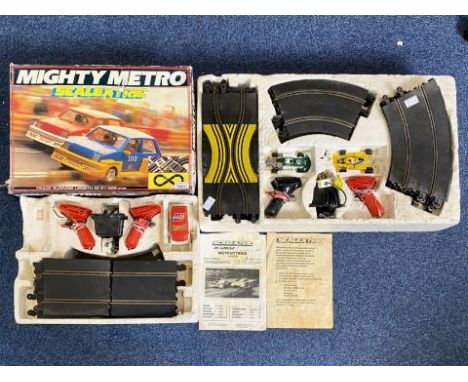 Two Boxes Scalextric, comprising Mighty Metro in box, missing one car, plus one other, both as found.