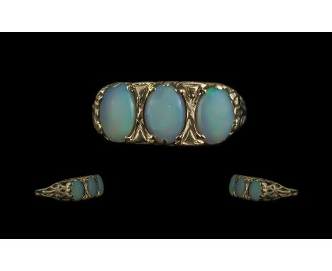 Ladies 9ct Gold - Attractive 3 Stone Opal Set Ring. Full Hallmark to Shank. Opals of Pleasing Colour. Est Weight 3 cts. Ring 