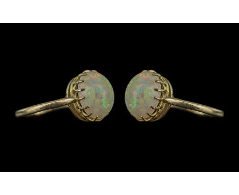 Antique Period - Pleasing 9ct Gold Cabochon Cut Opal Ring. Marked 9ct to Interior of Shank. The Opal of Excellent Multi-Colou