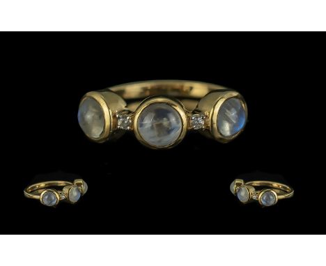 Moonstone Trilogy Ring, three moonstone cabochons,, each with a very strong presence of the brilliant blue inner light or adu