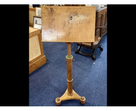 Acornman Lectern/ Music Stand, with adjustable height and raised on three ball feet, hand carved in oak in the business start