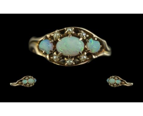 Antique Period 9ct Gold Opal and Seed Pearl Set Ring. The Opals of Pleasing Colours. Ring Size N. Weight 2.6 grams. Shank / S