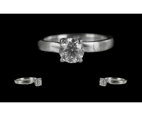 Ladies 18ct White Gold Contemporary Single Stone Diamond Set Ring, full hallmark to interior of shank London 2016.  The round