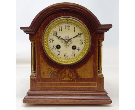 A mantel clock, with an enamel dial and an eight day movement striking on a bell, 21 cm high, and an American shelf clock (2)