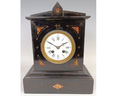 A Victorian black slate mantel clock, 30 cm high, a Japanese clock and a clock movement (3)