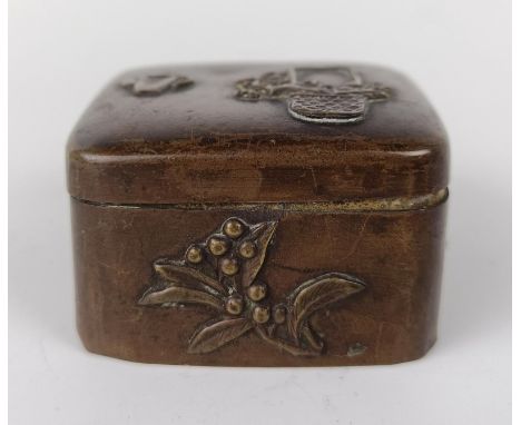 A Japanese bronze box, 4.5 cm wide, two others, 6 cm and 3.5 cm wide, and a Chinese cloisonné matchbox holder, decorated a dr