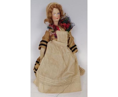 A vintage felt doll, 20 cm Provenance:&nbsp; Sold on behalf of the SNCB Society