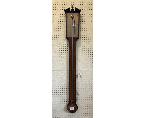 A George III style mahogany stick barometer, the silvered register signed Wm Scholefield, London, 95 cm highpart of the ciste