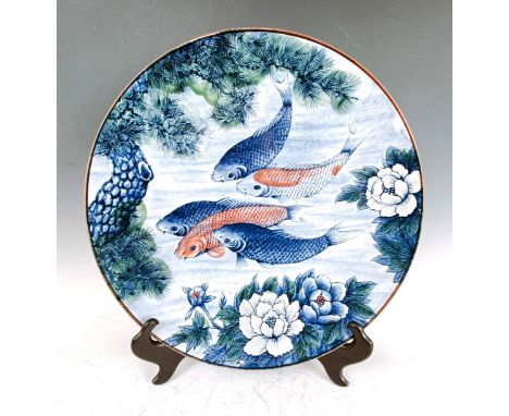 A Japanese charger, decorated carp, character mark to base, 41 cm diameter, two Chinese pewter tumblers, a cloisonné bowl, an