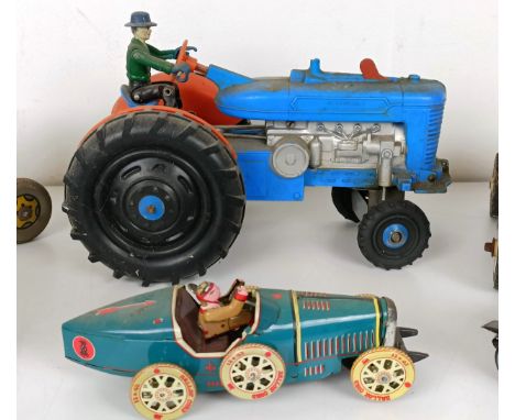 A tinplate model tractor and other play worn toys (box)