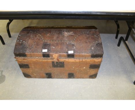 Domed and studded leather trunk