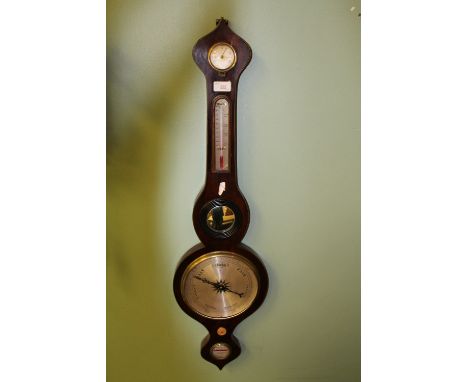 A 19th Century mahogany wheel cased barometer, hydrometer and thermometer, 97cm high Convex glass missing, thermometer glass 