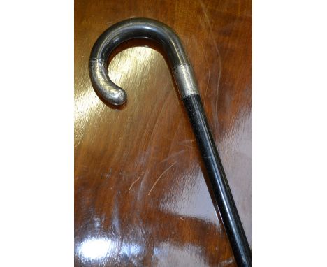 A 19th century horn hafted walking stick, silver ferrule and tip, 84cm high,  London 1895