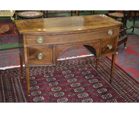 A George III mahogany inlaid bow front sideboard