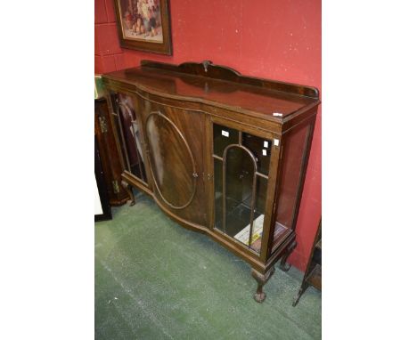 An early 20th century mahogany bow fronted display cabinet, c.1925