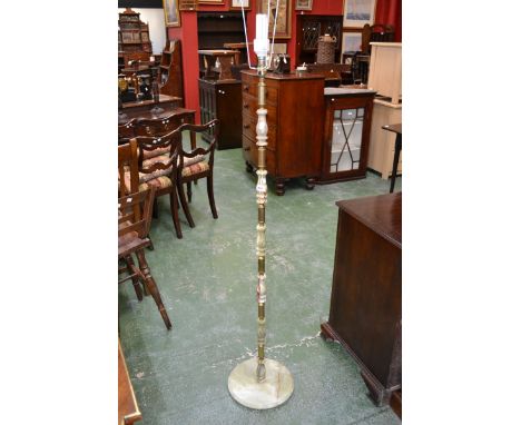 An onyx and gilt metal standard lamp.