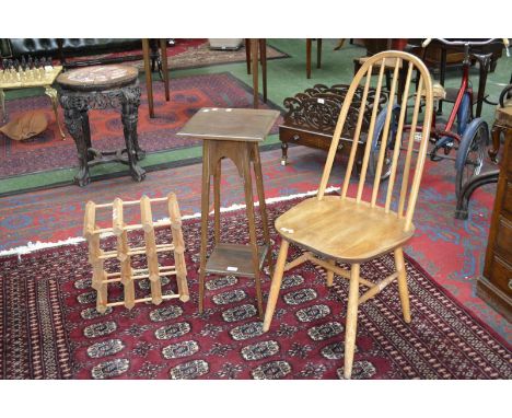 An Ercol style dining chair; a pine wine rack; an Edwardian jardiniere stand.