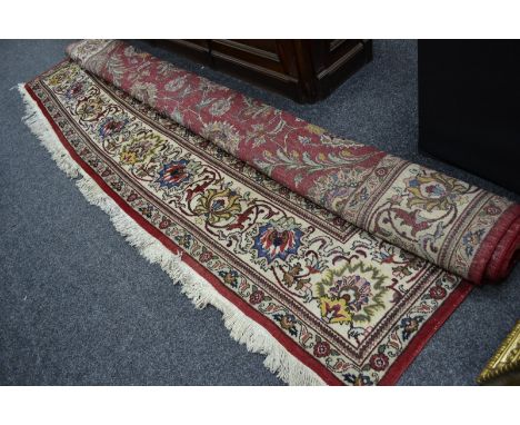A square Persian tabriz carpet, 348cm x 348cm, approx.