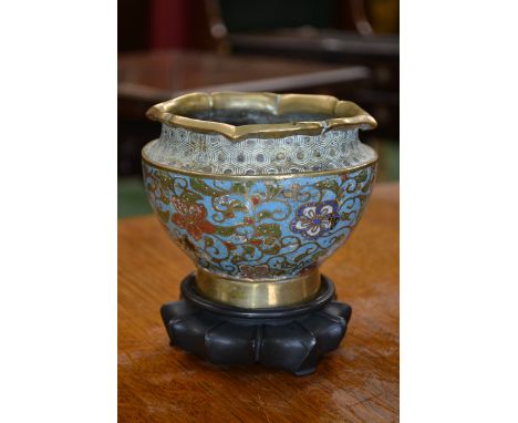 A Chinese cloisonné enamel ovoid cache pot, decorated with flowers and scrolling foliage on a turquoise ground, 12cm diam, ea