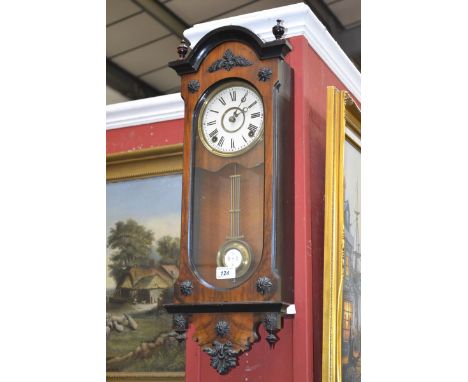 A Victorian Vienna clock, of small proportions, walnut case, eight day movement, white enamel face, Roman numerals