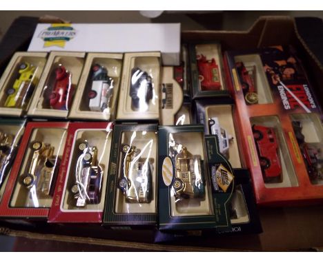 Approximately 28 Days-Gone model motor vehicles by Lledo to include some gold edition, all mint boxed - Est £30 - £40